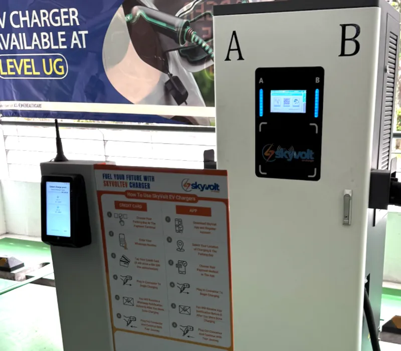 DC fast charger with integrated POS payment terminal — Hospital deployment.